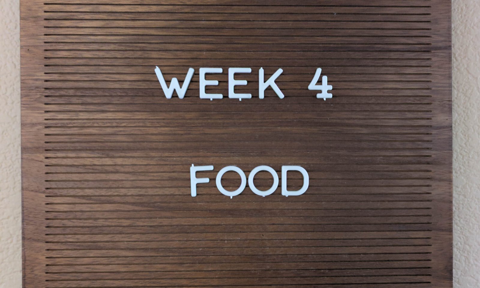 A sign that says Week 4 Food